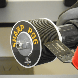 Sharp Pog multi-tool blade sharpener by Rack-A-Tiers. This round drill bit attachment is being used to sharpen a bauer brand multi tool blade.