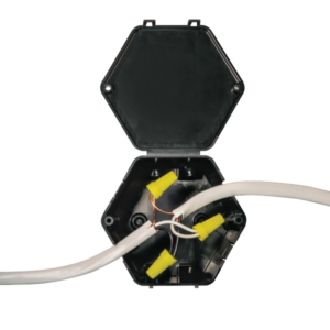 The Open Splice Junction Box made of black polymer. Inside the junction box are two white wires that have been spliced together.