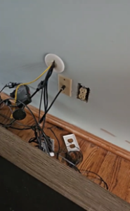 electrical outlet behind tv